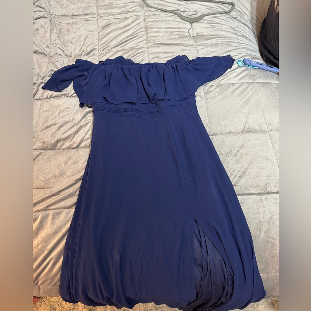 Navy blue formal dress with right leg slit. Off the shoulder
